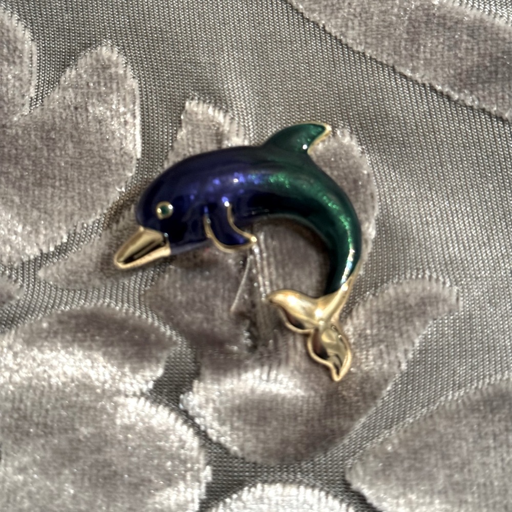 Golden Dolphin Broche with Green and Blue Jewel Tones